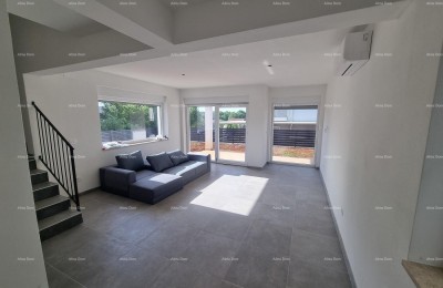 Moderne Doppelhaushälfte mit Dachterrasse und Panoramablick auf das Meer