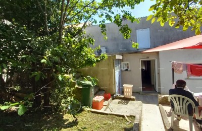 Pula! Erdgeschosswohnung mit großem Garten und Terrasse.
